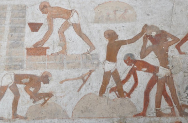 Ancient Egyptian wall painting showing workers engaged in construction and manual labor, illustrating men lifting, carrying, and shaping materials, symbolizing daily work in ancient Egypt.